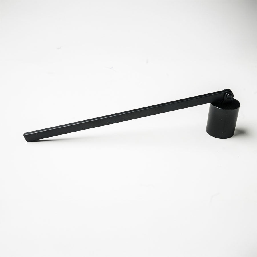 classic candle snuffer Black metal tool on a white background