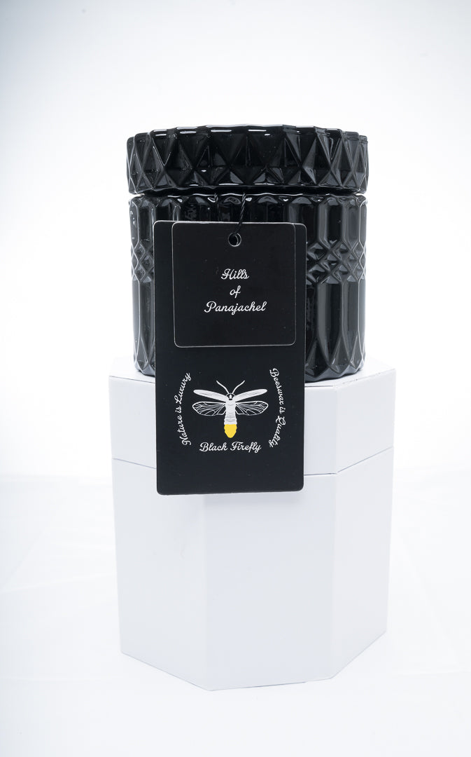 Black candle with a diamond pattern on a white stand Hills of Panajachel - Glass Jar Candle