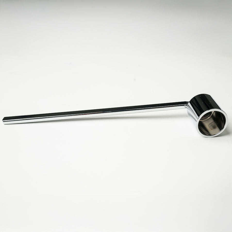 classic candle snuffer on a white background